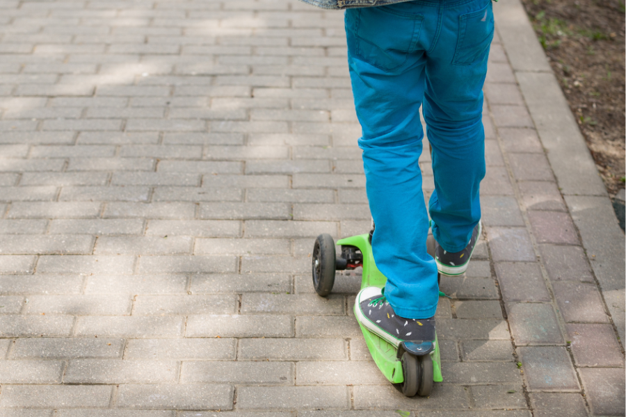 Child on scooter